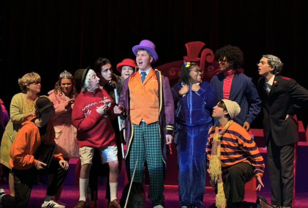 Manny Scobie also known as Willy Wonka singing his heart out during the last dress rehearsal before opening night.  